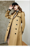 Woman wearing a beige trench coat 