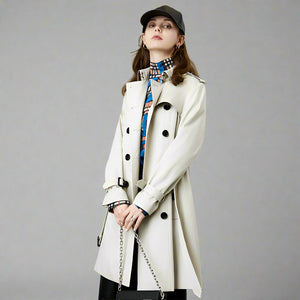 beige trench coat with black buttons